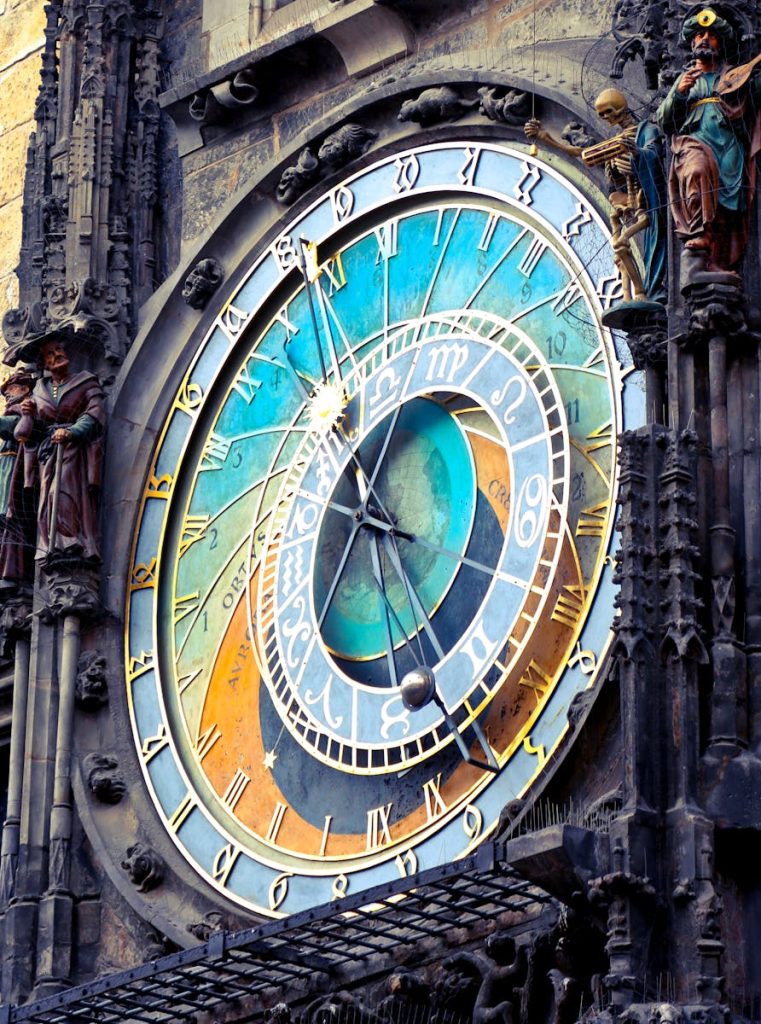 Close-up of Prague's historic astronomical clock featuring intricate details and vibrant colors.